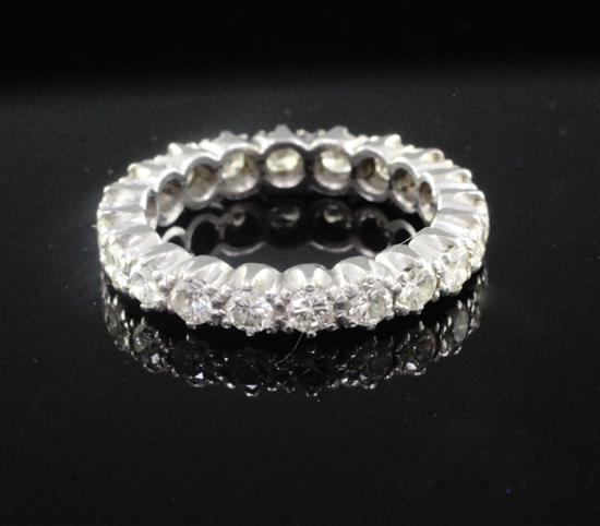 A platinum and diamond full eternity ring, size N.